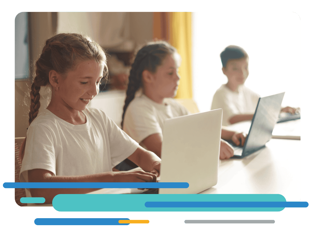 Children learning using laptop computers