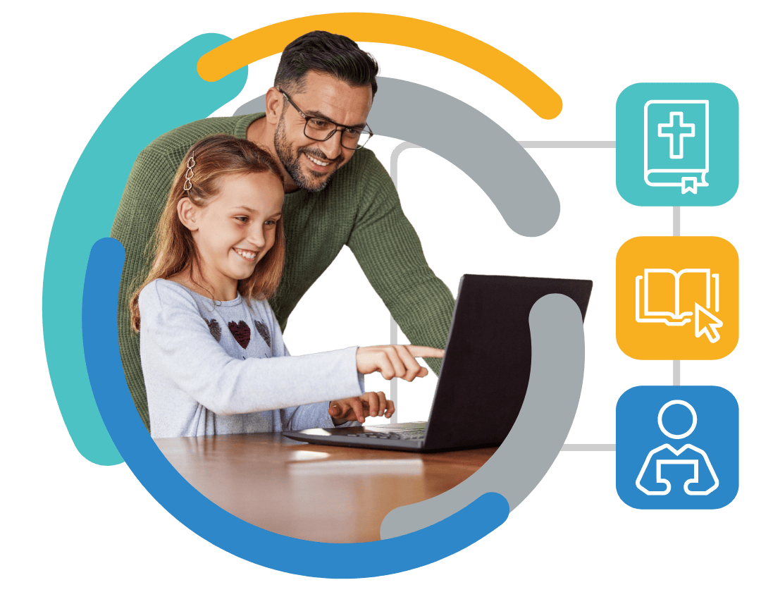 A smiling father and daughter using a laptop computer